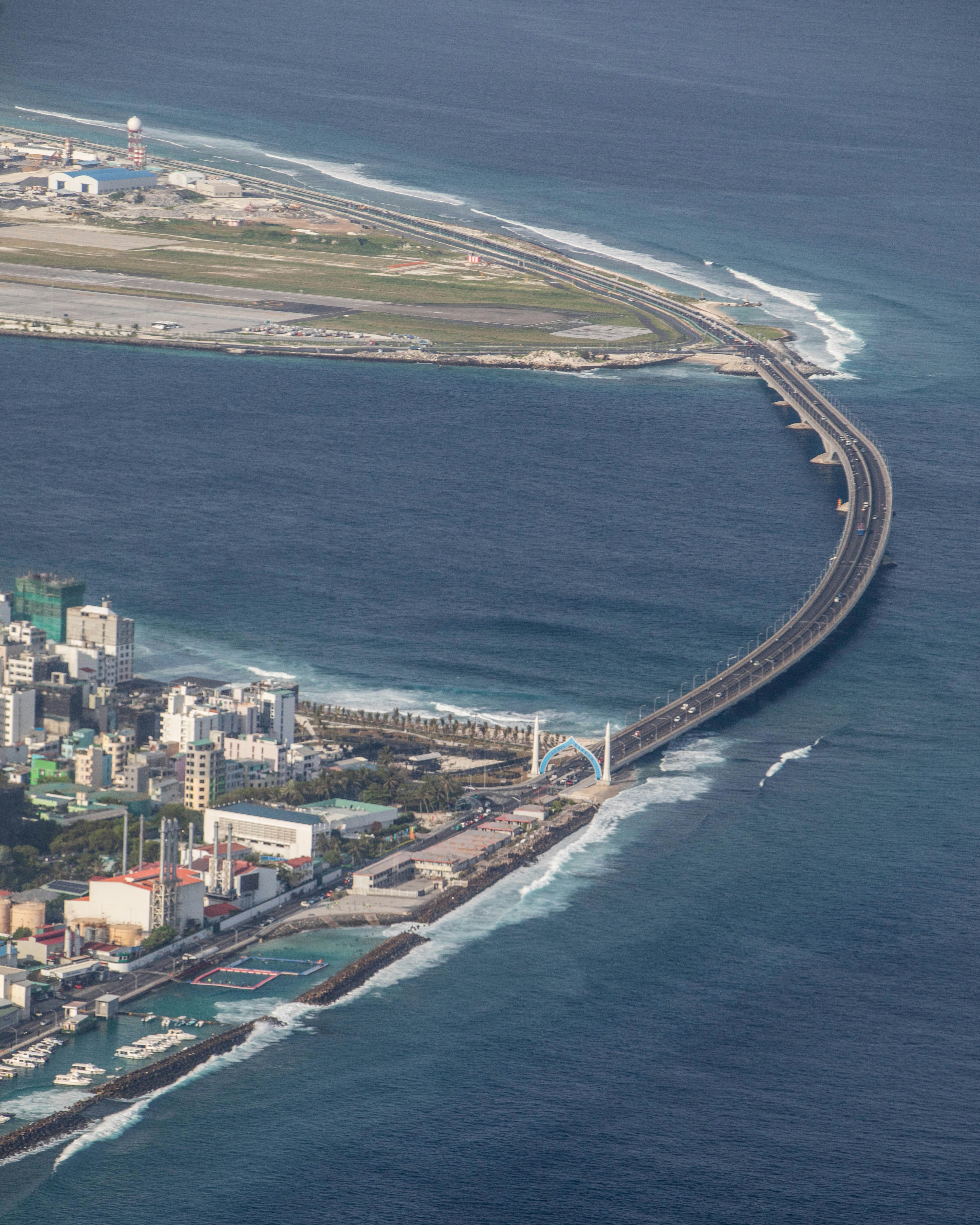 aerial photography of bridge and buildings